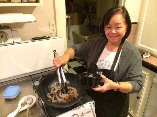 Supapan preparing the shrimp.