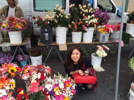Violist Do Huong Tra My with California flowers.