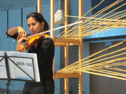 Shalini Vijayan performing Cage in Los Angeles within a sculpture of Minkeo Grimmer.