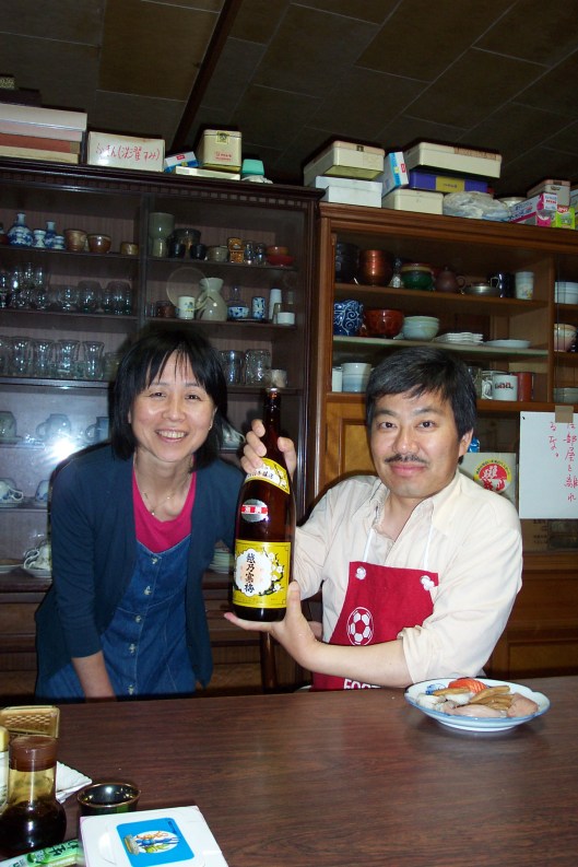 Miko and Ippei showing us their favorite sake in 2002.