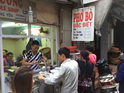 Use this sign to locate Pho Suong, Happy Noodle.