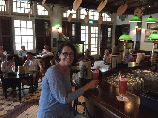 Jan and the Raffles' Long Bar with an unforgettable atmosphere of Maugham.