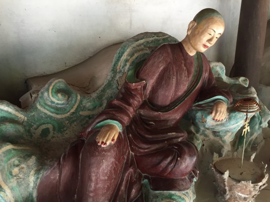 A reclining Buddha approaching a gentle nirvana.