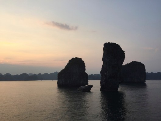 Imposing rock formations beautifully illuminated as night approaches.